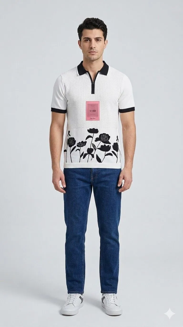 A men standing upright direction in relaxed posture wearing white half sleeve collar t-shirt and wearing dark blue jeans.